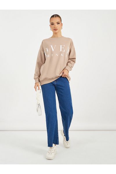 Styli Oversized Longline Slogan Sweatshirt