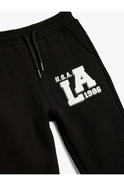 Koton Jogger Eşofman Altı Şehir Baskılı Beli Bağlamalı Cepli Şardonlu