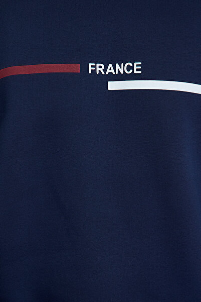 Trendyol Collection Sötétkék túlméretes polár nyomott pulóver - TMNAW25SW00187