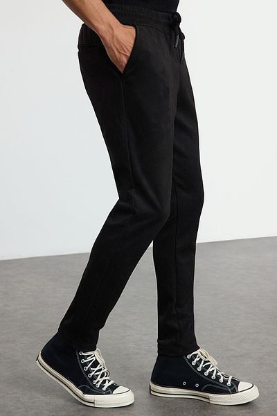 Trendyol Collection Μαύρο Slim Fit δεμένο στη μέση ελαστικό σουέτ παντελόνι TMNAW25PL00030