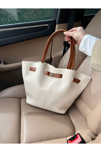 NOTHING Women's Cream Tan Leather Hand and Shoulder Bag with Magnet Closure and Lock Detail