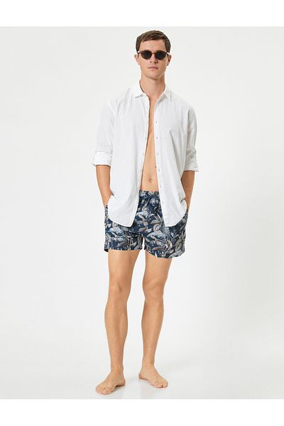 Koton Blattschnür-Badeshorts mit Blattmuster