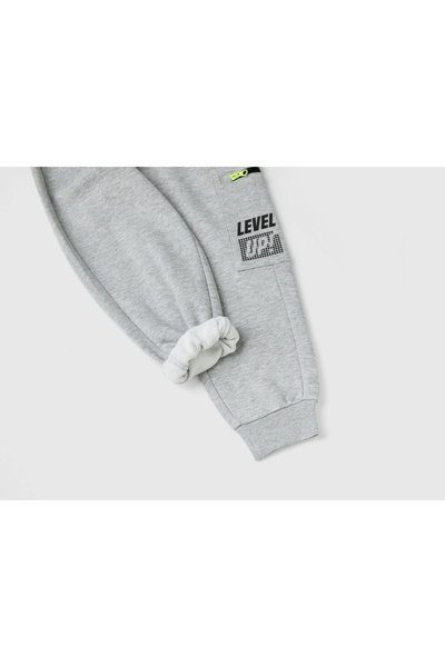 United Colors of Benetton Φούτερ για αγόρι σε γκρι μελανζέ 3D στάμπα με αριστερές πλαϊνές τσέπες ελαστική μέση