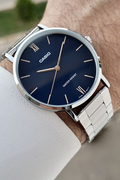 Casio Men's Wristwatch with Dark Blue Cord and Metallic Color