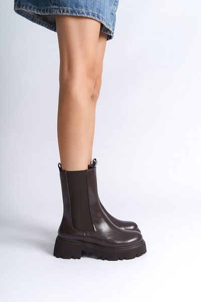 Capone Outfitters Lange Damenstiefel mit Trak-Sohle und seitlichem Gummizug
