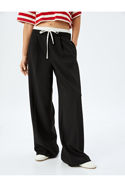 Koton Çift Bel Detaylı Bağlamalı Cepli Çizgili Geniş Paça Baggy Kumaş Pantolon