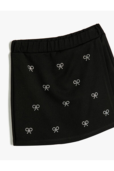 Koton Dvouřadá krátká sukně s potiskem kamenů - detail mašle, elastický pas