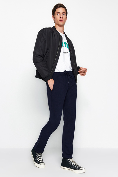 Trendyol Collection Sötétkék pamut nyitott lábú melegítőnadrág - normál szabású TMNAW24EA00011