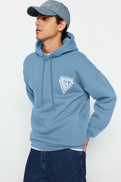 Trendyol Collection College Printed - Φούτερ φλις με κουκούλα 100% βαμβακερό μπλε υπερμεγέθη TMNAW24SW00063