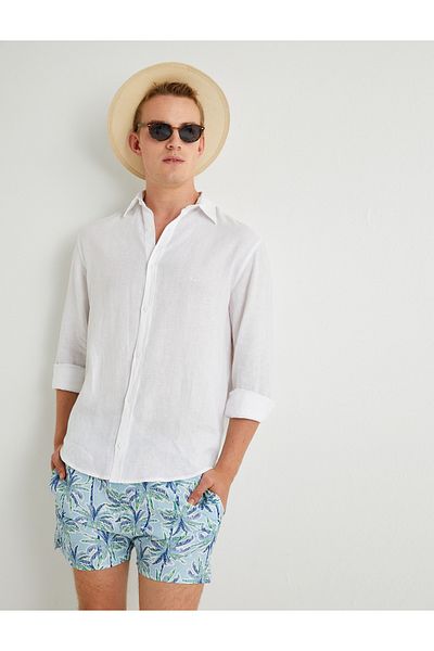 Koton Badeshorts mit Palmen-Print und Schnürung an der Taille und Taschen