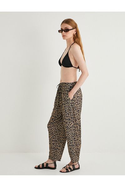 Koton Pantaloni legați în talie cu model leopard și buzunare