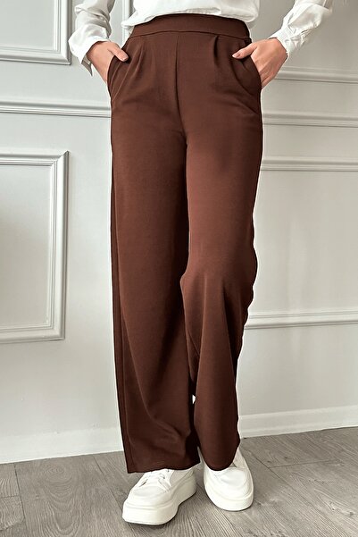 InStyle Spodnie z szerokimi nogawkami i zakładkami w kolorze gorzkiego brązu