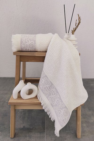 Sevim Liliac Set de 2 prosoape pentru mâini/față - Borduri în relief și ciucuri moi - 50x85 cm