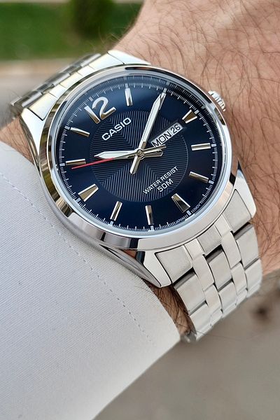 Casio Men's Wristwatch with Dark Blue Cord and Metallic Color