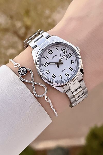 Casio Women Wrist Watch with Dial White Cord Metallic Color 2 Years Guarantee