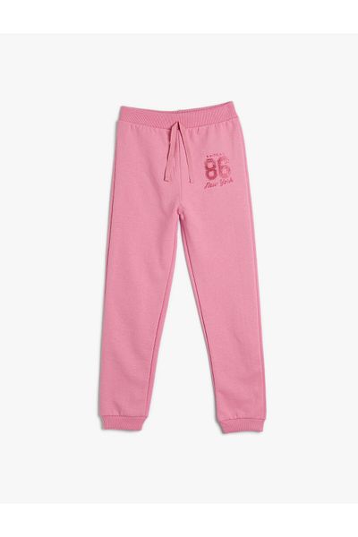 Koton Pantaloni de sport jogger cu talie cravată și imprimeu cu sclipici