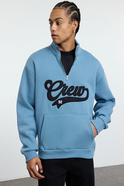 Trendyol Collection Modrá oversize mikina se stojatým límcem – se zipem a vyšívaná Tmnaw25Sw00083