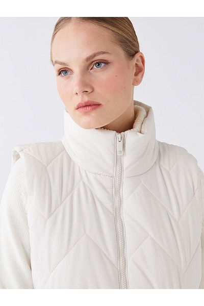 LC Waikiki LCW Modest Stehkragen-Pufferweste für Damen mit selbstgemustertem Muster
