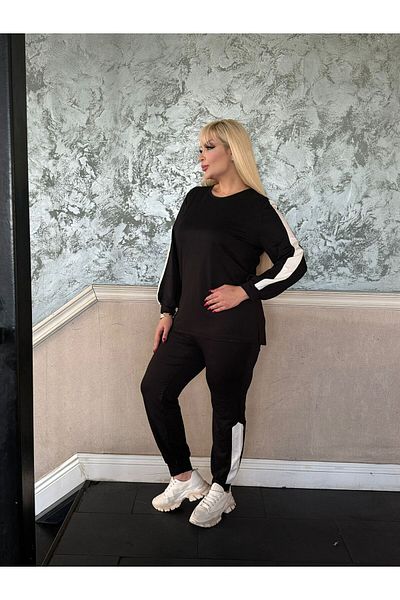 Butik Nilyam طقم أسود مرن كبير الحجم برقبة دائرية وتفاصيل جانبية - 24681