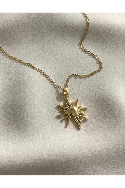 Bubbleatelier Steel gold sun pendant