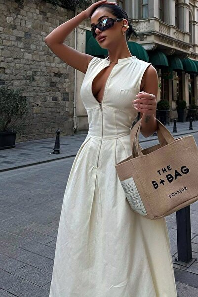 Vivika Kadın Hakim Yaka Kolsuz Önden Fermuarlı Bel Oturtmalı Cepli Kloş Kesim Maxi Boy Elbise