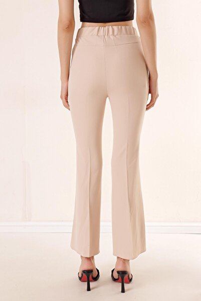 By Saygı Flared Trousers