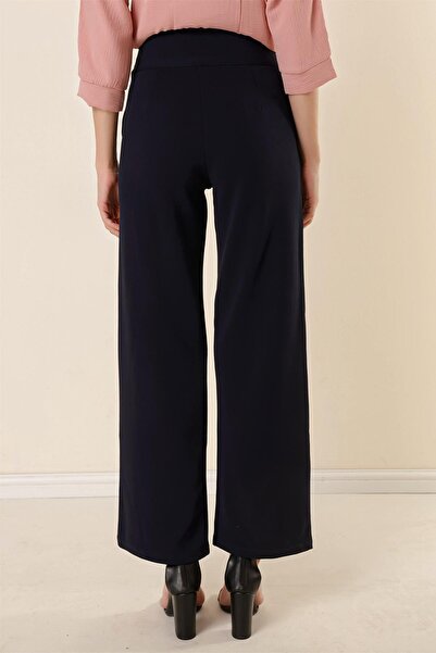 By Saygı Pletené krepové kalhoty Palazzo s kapsami s páskem