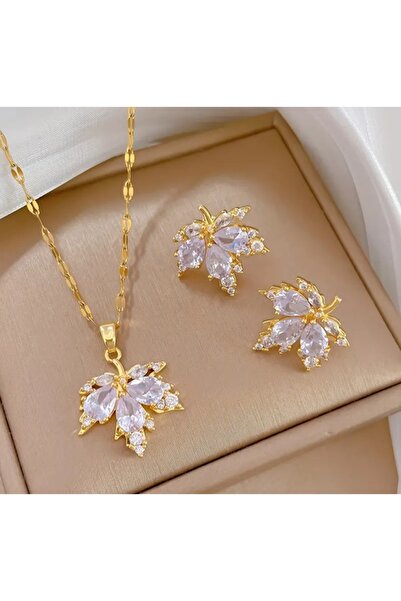 stainless steell VİP altın yaprak tasarımlı paslanmaz zirkon incili küpe koly...