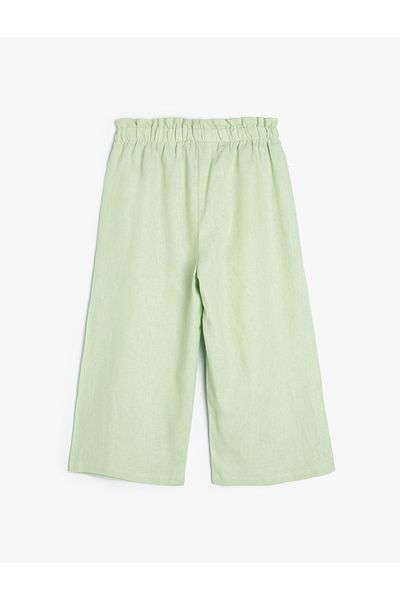 Koton Leinenhose mit elastischem Bund und Knopfdetail