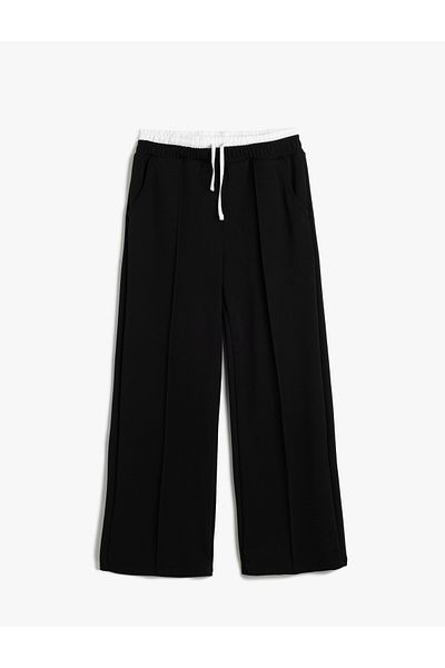Koton 5wkg40234ak 999 Pantaloni negri din jerseu pentru fete