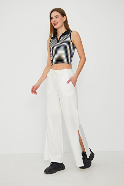 Avones بنطال رياضي نسائي بجيب وفتحة على الساق