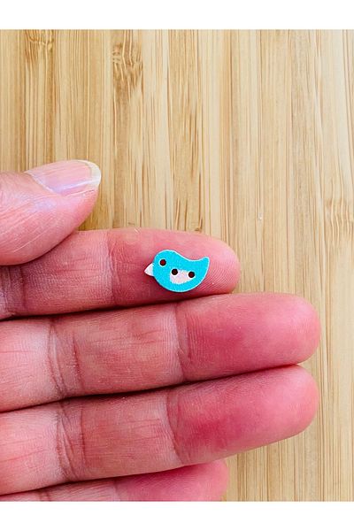 Kartopu White Painted Patterned Shaped Wood Button 9mm X 13mm. Pack of 6. The Bird Figure Is Turquoise.