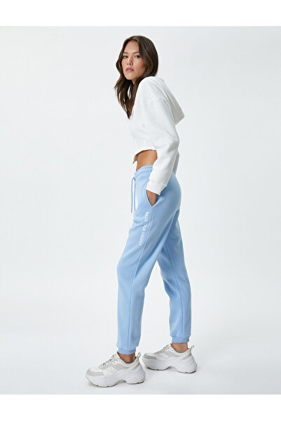 Koton Jogger Φούτερ άνετο κομμένο με τσέπες εκτύπωση λεπτομέρειας Δέσιμο μέση...