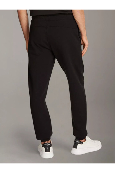 Calvin Klein Erkek Beli ve Paçası Lastik Logo Yama Detaylı Siyah Eşofman Altı K10K113579-BEH