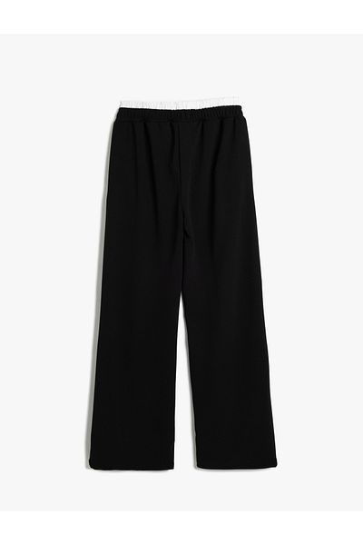 Koton 5wkg40234ak 999 Pantaloni negri din jerseu pentru fete
