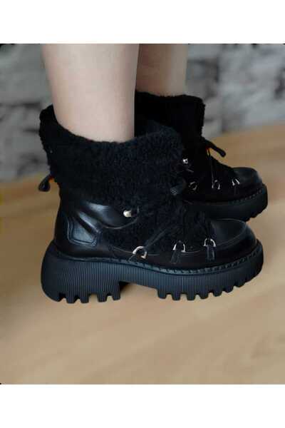 Zera kürklü siyah deri kadın bot