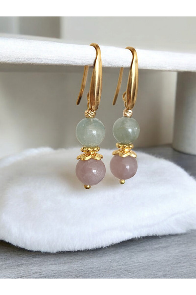 Home أقراط من الفولاذ بحجر الكونزيت والزبرجد