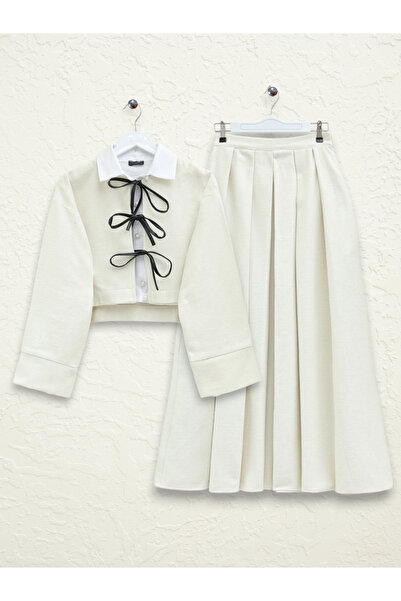 Modamorfo Elöl megkötős öltöny rakott szoknyával -krém
