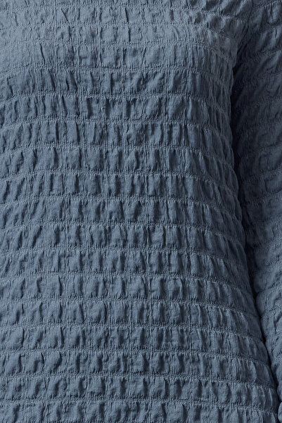 Trendyol Collection Indigově jednobarevný stojáček s texturou, límec A-line Strečové maxi pletené šaty Twoaw25El00197