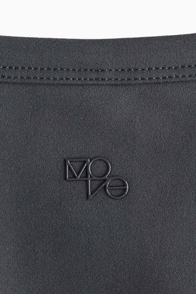 H&M قميص رياضي قصير من دراي موف™
