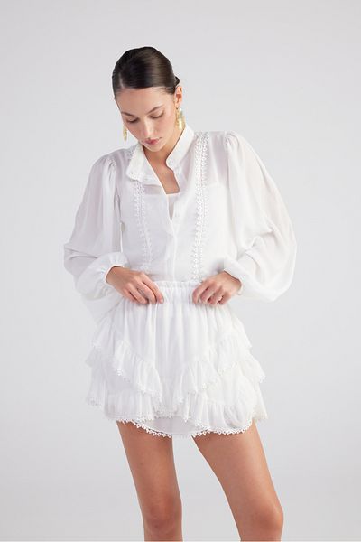 HOLLY LOLLY Detailní výšivka asymetrického střihu s podšívkou Mini Pixie sukně bílá