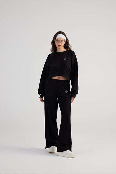 HOLLY LOLLY Black Cali Sweatpants with Wide Leg and Slits