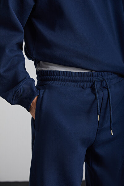 GRIMELANGE Kyoto férfi organikus pamut polár belső, széles szabású, rugalmas szárú Jogger sötétkék melegítőnadrág