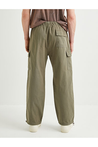 Koton Nákladní padákové volné kalhoty s elastickými kapsami v pase a zarážkami