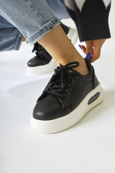 Limoya Loura Чорні шкіряні кросівки з візерунком, шнурівкою та підошвою, жіно...