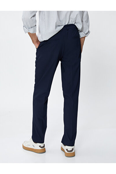 Koton Υφασμάτινο παντελόνι με λεπτή εφαρμογή - Λεπτομέρεια με κουμπιά και τσέπη