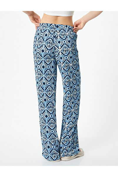 Koton Široké kalhoty pohodlného střihu s etnickým vzorem