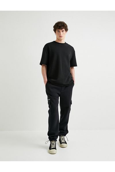 Koton Jogginghose mit Cargo-Tasche, elastischem Bund und Reißverschlussdetail