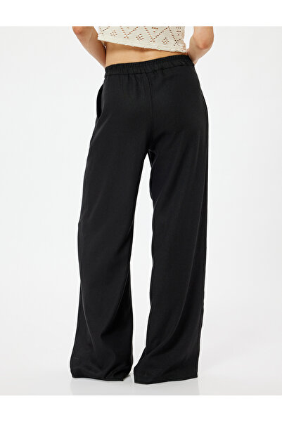 Koton Plátěné kalhoty s vysokým pasem - široká noha, kapsa a detail záhybu