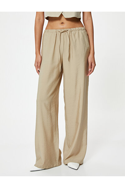 Koton Široké kalhoty s modální látkou a kapsami v pase
